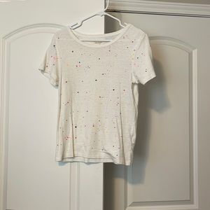 White top with paint splatters